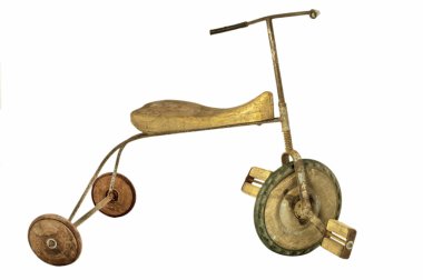 Old tricycle with wooden wheels clipart
