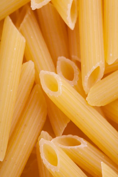 Pasta Penne textura fundo — Fotografia de Stock