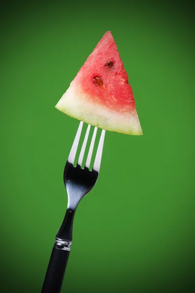 Fork with a slice of watermelon — Stock Photo, Image