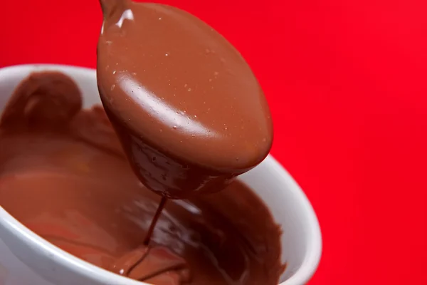 Hot chocolate with spoon — Stock Photo, Image