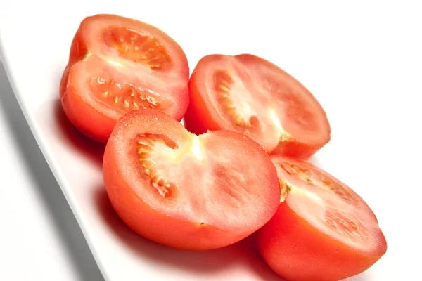 Tomate en un plato —  Fotos de Stock