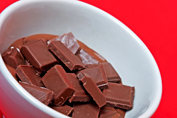 Squares melted chocolate — Stock Photo, Image