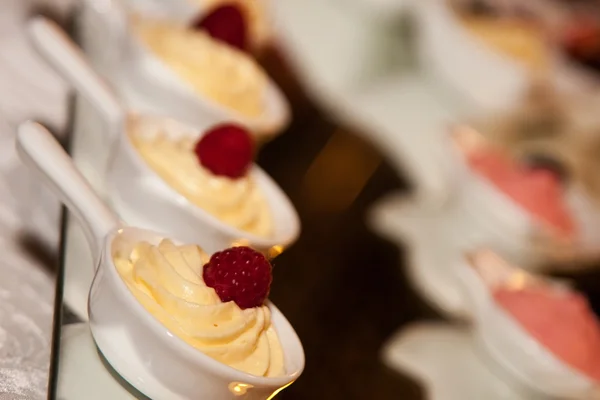 Raspberry mousse in a row — Stock Photo, Image