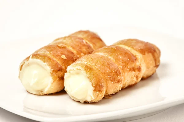 Pastry roll with cream — Stock Photo, Image