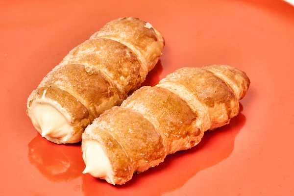 Pastry roll with cream — Stock Photo, Image