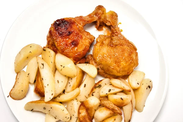 Курица с картошкой — стоковое фото