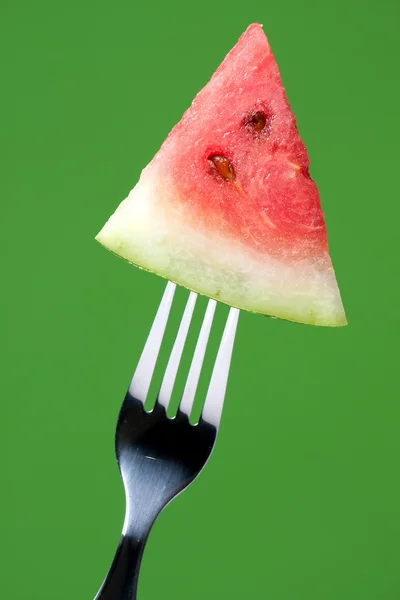 Fork with a slice of watermelon — Stock Photo, Image