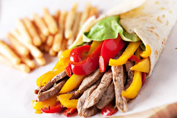 Fajitas with fries Royalty Free Stock Photos