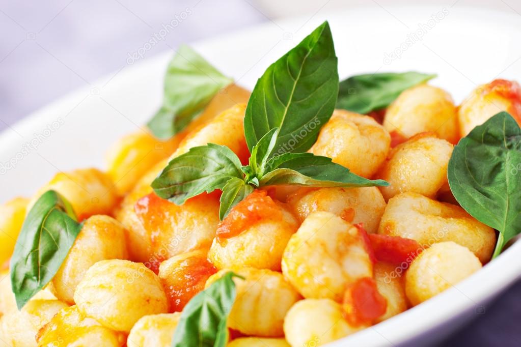Gnocchi with tomato mozzarella Stock Photo by ©svariophoto 66535809