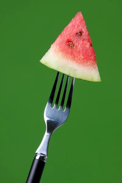 Vork met een schijfje van watermeloen — Stockfoto