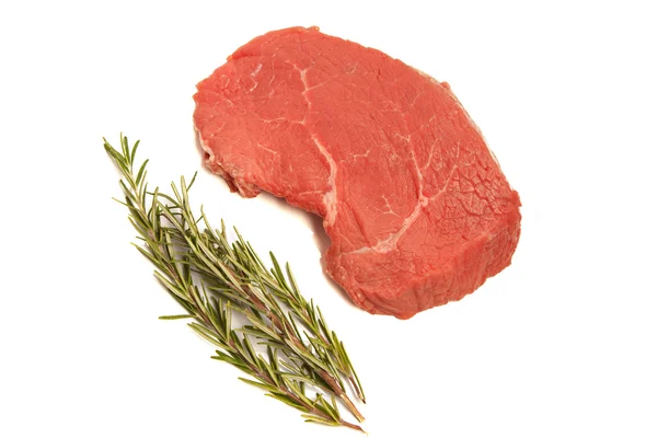 Fresh beef and rosemary — Stock Photo, Image