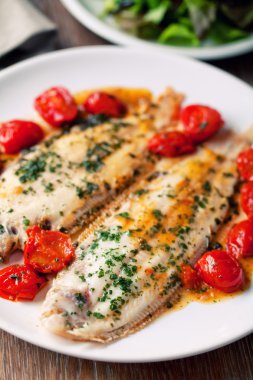 Sole with cherry tomatoes clipart