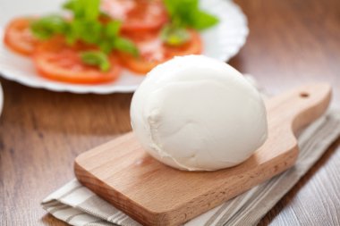 Buffalo mozzarella on board clipart