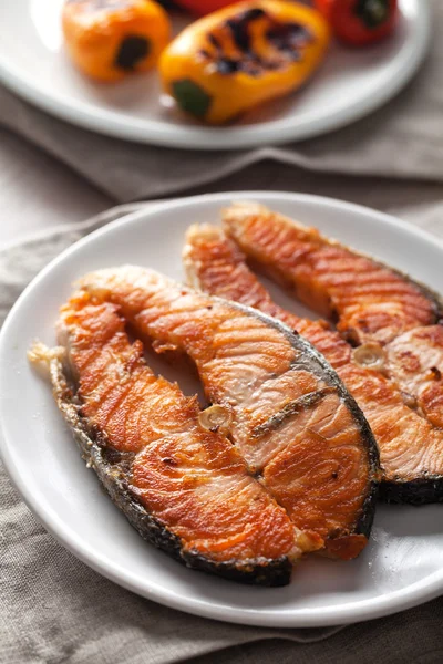 Salmon on white plate — Stock Photo, Image