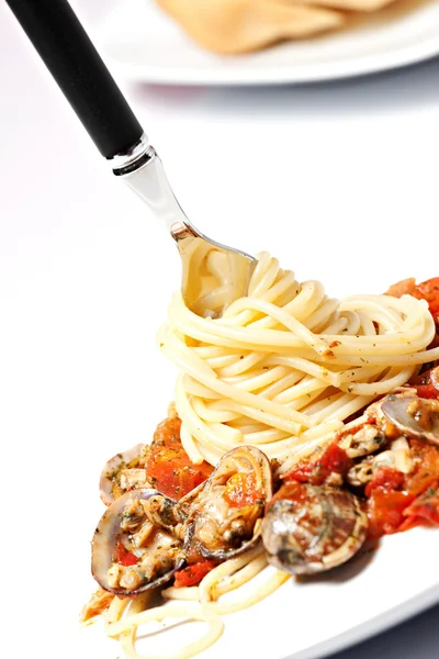 Fork with spaghetti with seafood — Stock Photo, Image