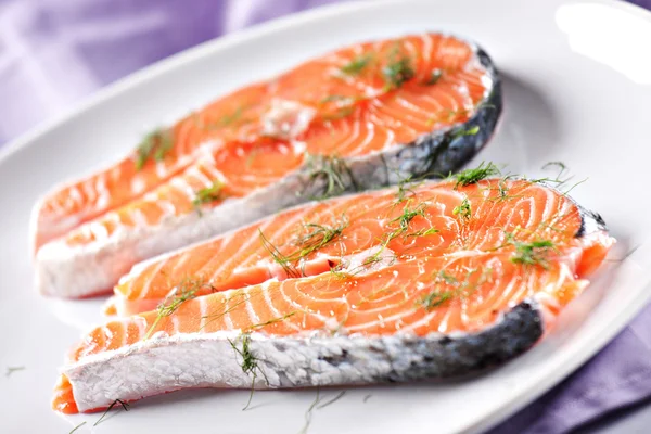 Raw Salmon on plate — Stock Photo, Image