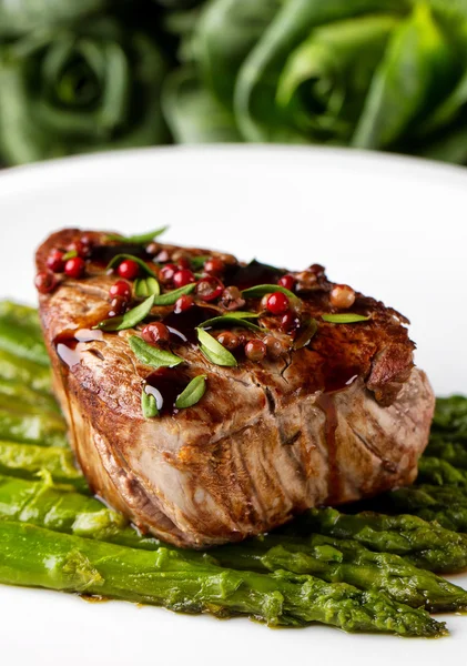 Beef fillet with pink pepper — Stock Photo, Image