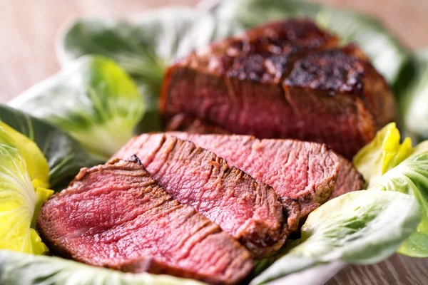 Beef tenderloin sliced