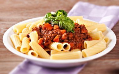 Macaroni Bolognese on plate clipart
