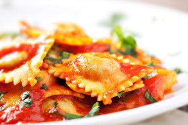 Ravioli with tomato sauce clipart