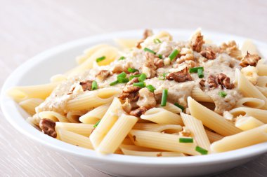 Pasta with walnut sauce clipart