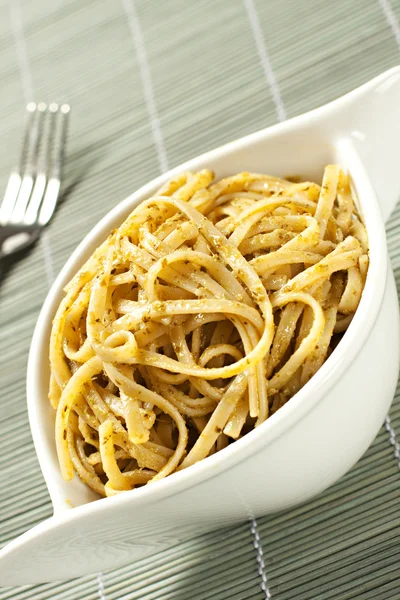 Spaghetti with pesto sauce — Stock Photo, Image