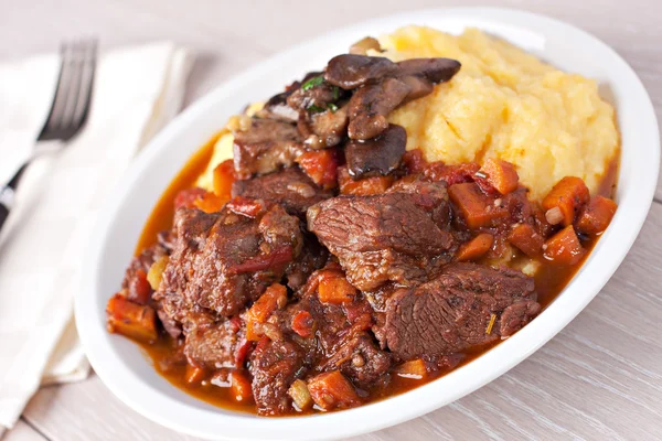 Tasty Polenta and stew — Stock Photo, Image