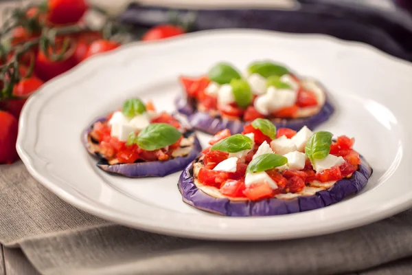 Eggplants Parmigiana on plate — Stock Photo, Image