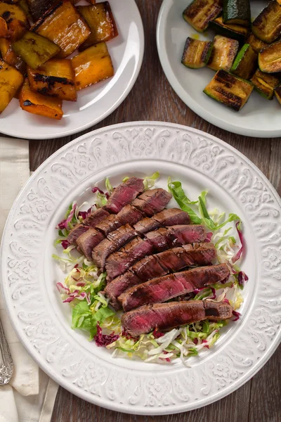 Fillet of beef with mixed salad. — Stock Photo, Image