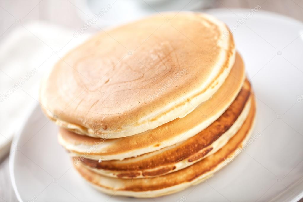 Golden Pancakes on plate