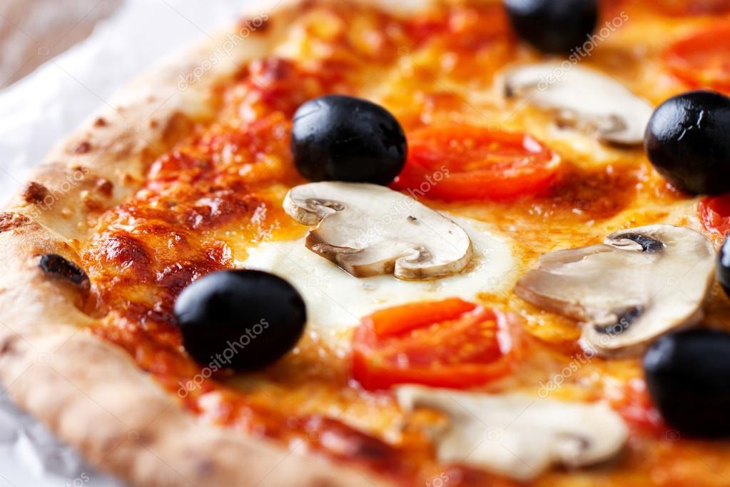 Pizza with olives and mushrooms