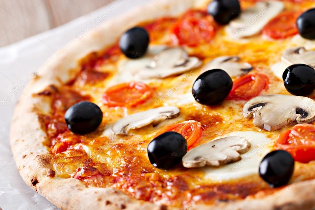 Pizza with olives and mushrooms