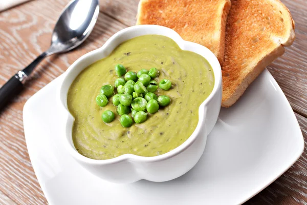 Pea soup in white bowl — Stock Photo, Image