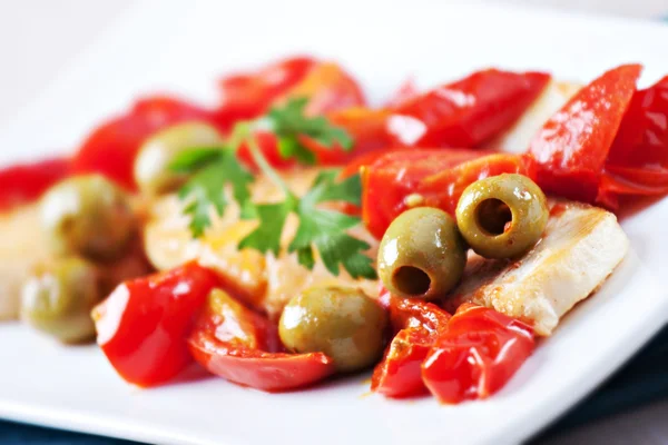 Fillet of halibut with tomatoes and olives — Stock Photo, Image