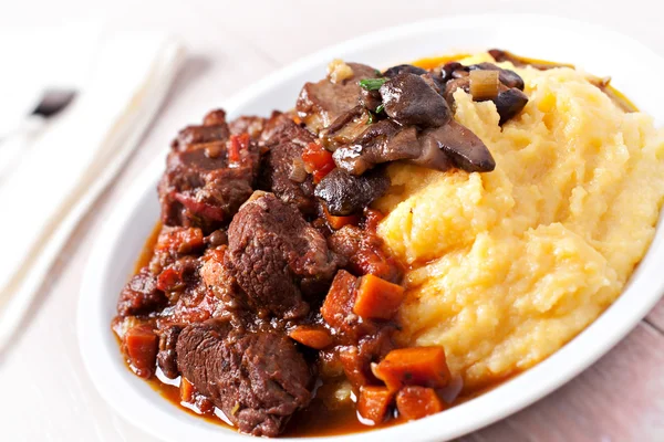 Italian polenta and stew — Stock Photo, Image