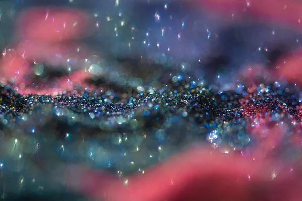 Soyut parıltı ışıkları mavi ve mor renkli bokeh arkaplan