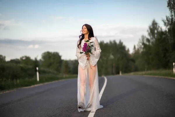 Young Woman Wear White Dress Holding Lilac Flower Empty Country — Stockfoto