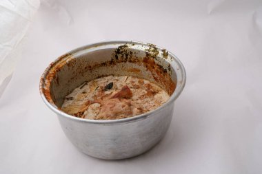 photo of rotten soup in steel pot clipart