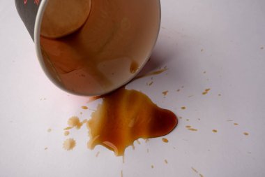 basra, Iraq - june 08, 2021: photo spilled coffee from paper cup