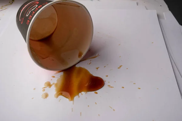 basra, Iraq - june 08, 2021: photo spilled coffee from paper cup