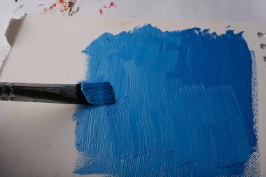 Yağlı boyaların tuvale karıştığı soyut bir fotoğraf