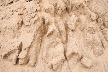 Kum yığınındaki oyukların makro fotoğrafı