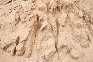 Kum yığınındaki oyukların makro fotoğrafı