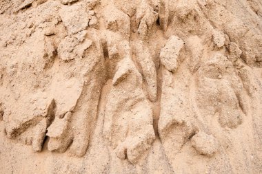 Kum yığınındaki oyukların makro fotoğrafı