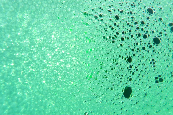 macro photo of colored soap foam