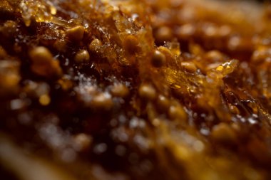 Organik kurutulmuş incir tohumu ve şuruplu hamurun makro dokusu