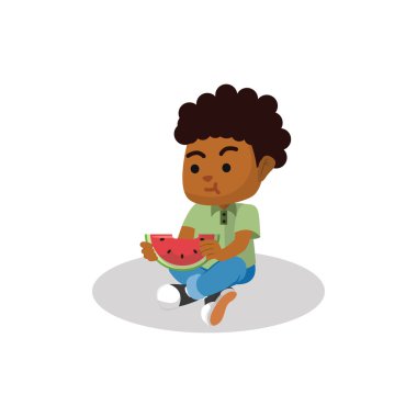 Boy eating watermelon