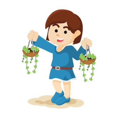 bir kadın bitkiler taşıyor