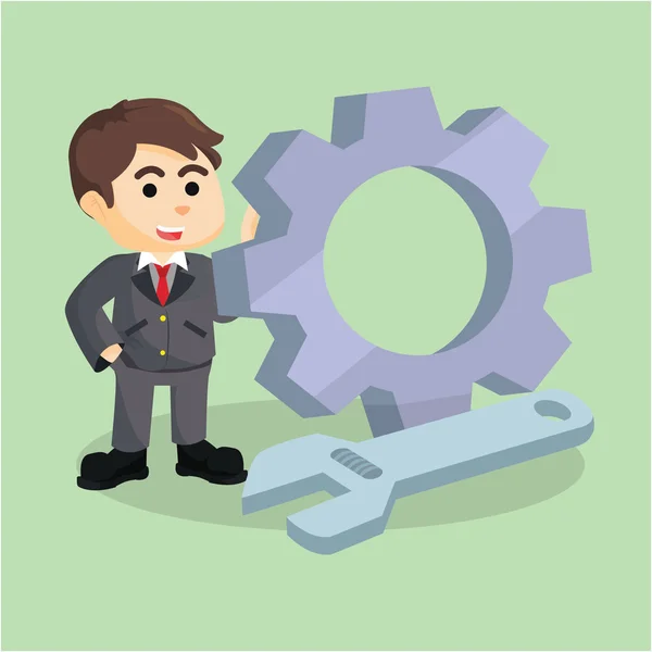 A businessman standing beside the gear and wrench — Stock Vector