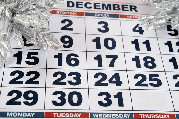 Calendar for December with silver Christmas decorations — Stock Photo, Image